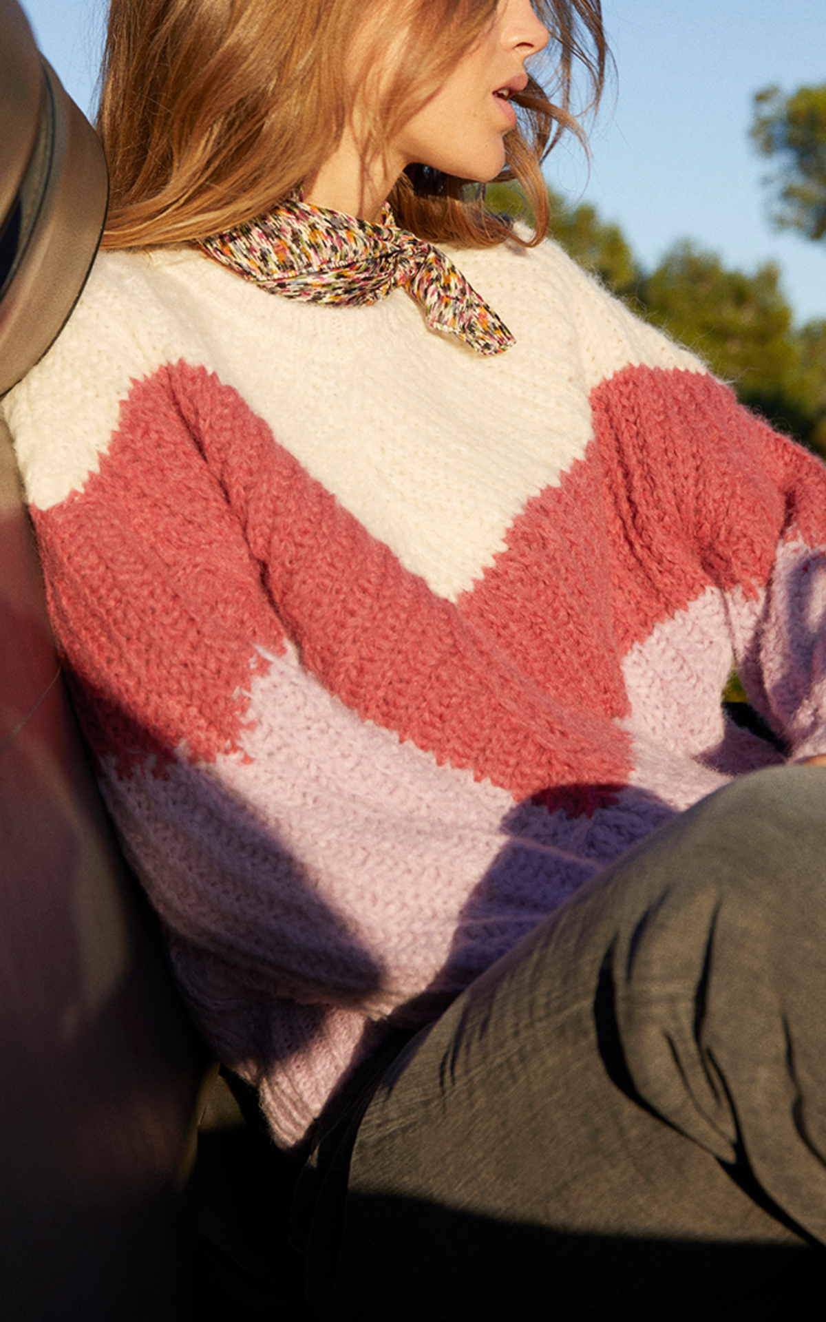 Woman wearing a ba&sh sweater